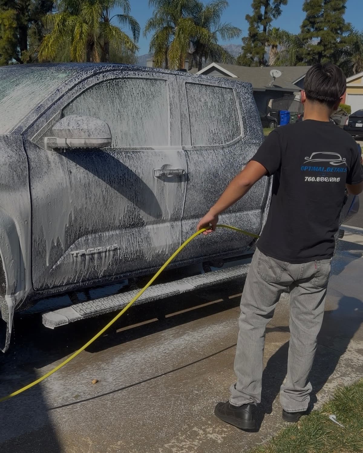 Optimal Details applying foam to a vehicle on site in the High Desert