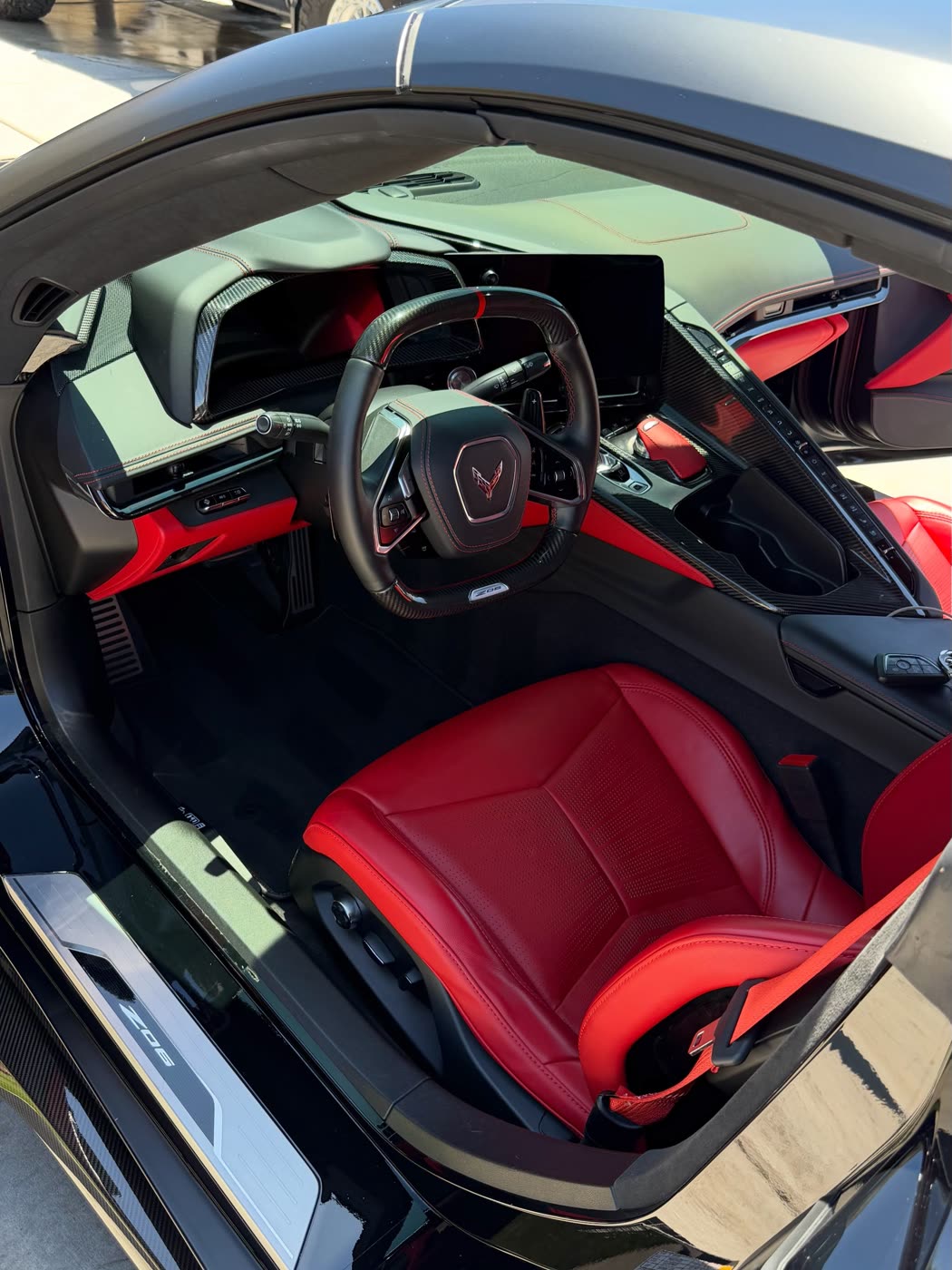 Corvette C8 cabin with red leather after interior restoration